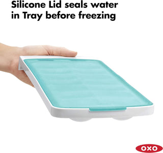 Ice cube tray with silicone cover