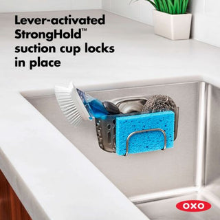 Stay-put sink basket organizer

